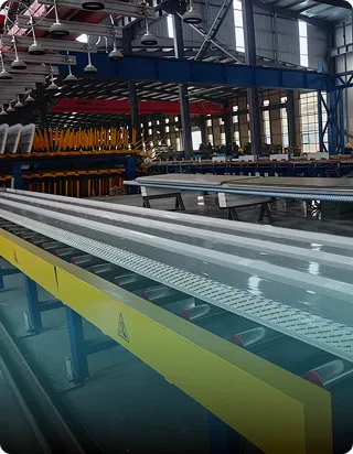Insulated panels moving through factory equipment