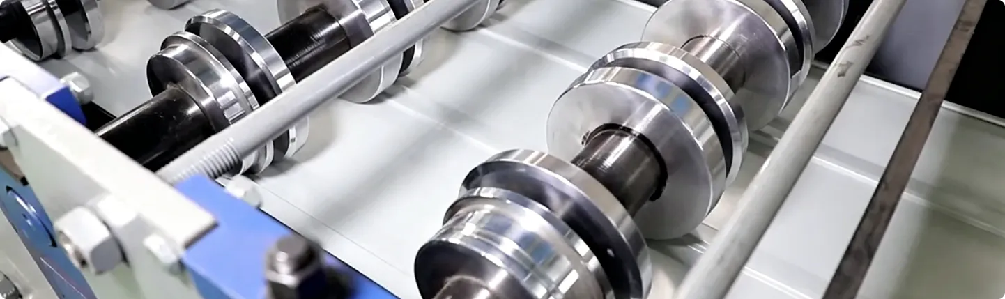 Metal panel profiling rollers on production equipment