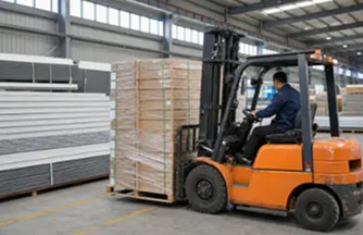 Forklift moving packaged insulated panels